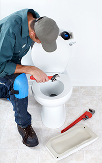 clogged washroom commode repair